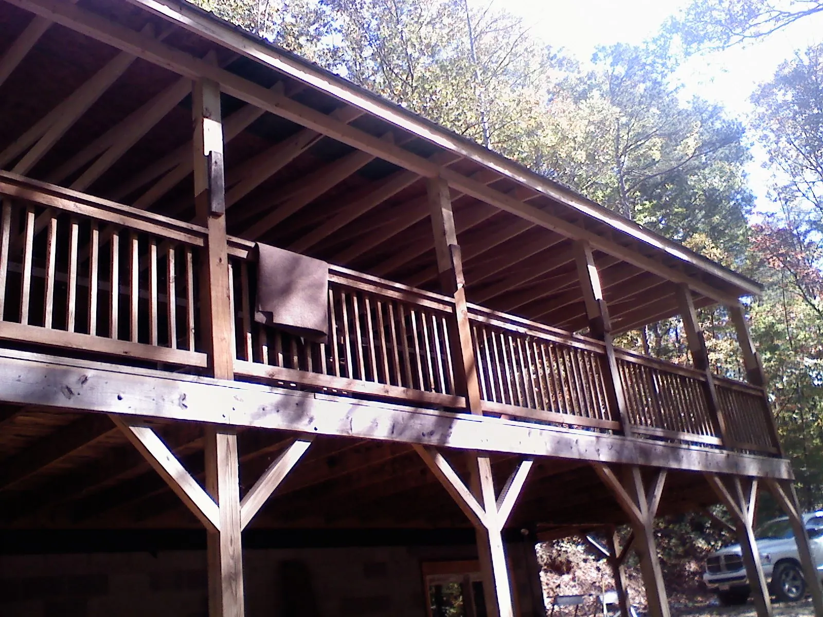 Timber framing under a new elevated porch and deck — Roof Leak Repair in Tuskegee by Roofing Brothers